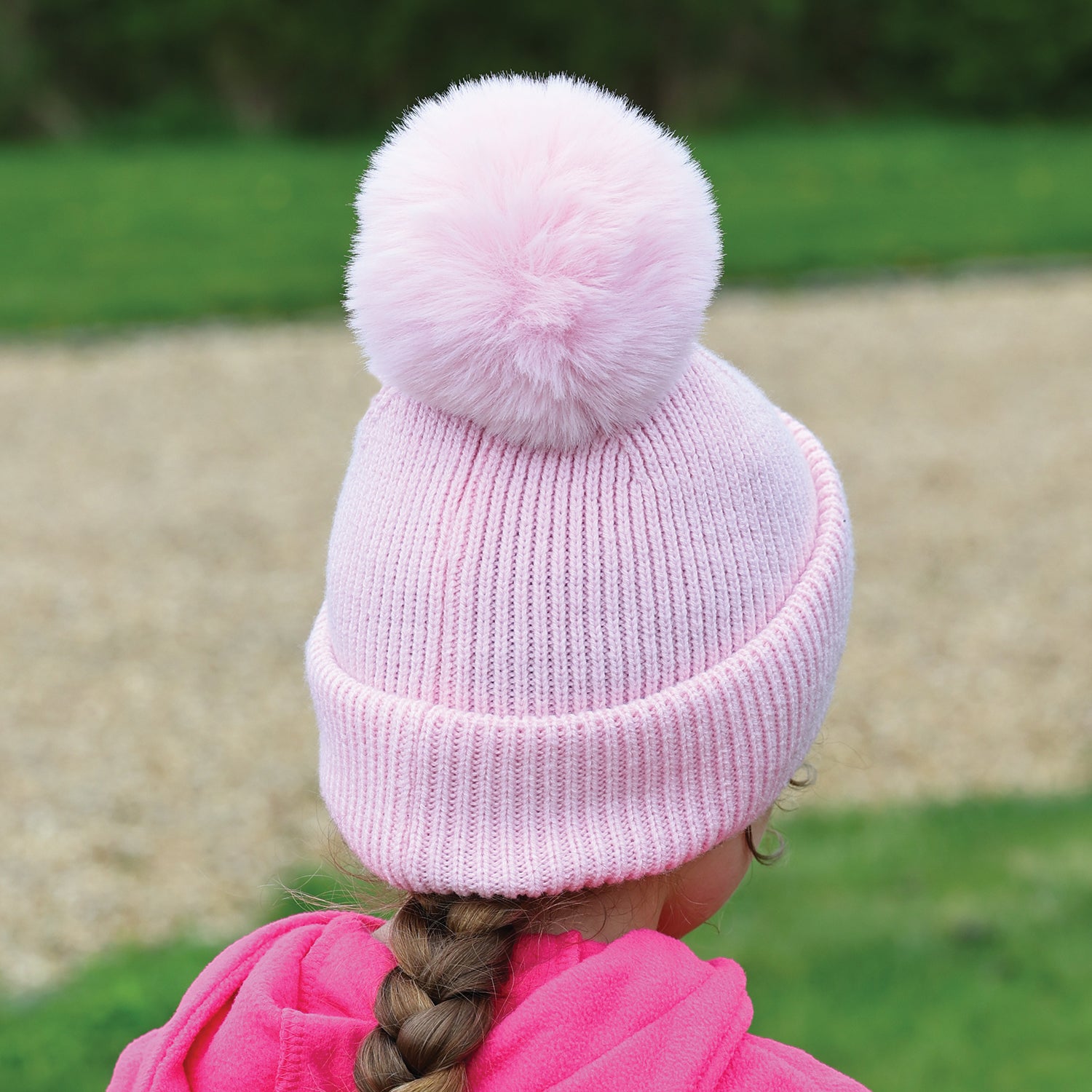 Pale pink woolly children's bobble hat 